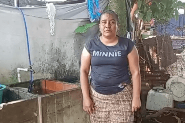 Petrona requesting water filter next to her sink which has running water but it is too unsafe to drink